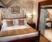 Courtyard Bedroom and Sitting Room room, Charingworth Manor Hotel